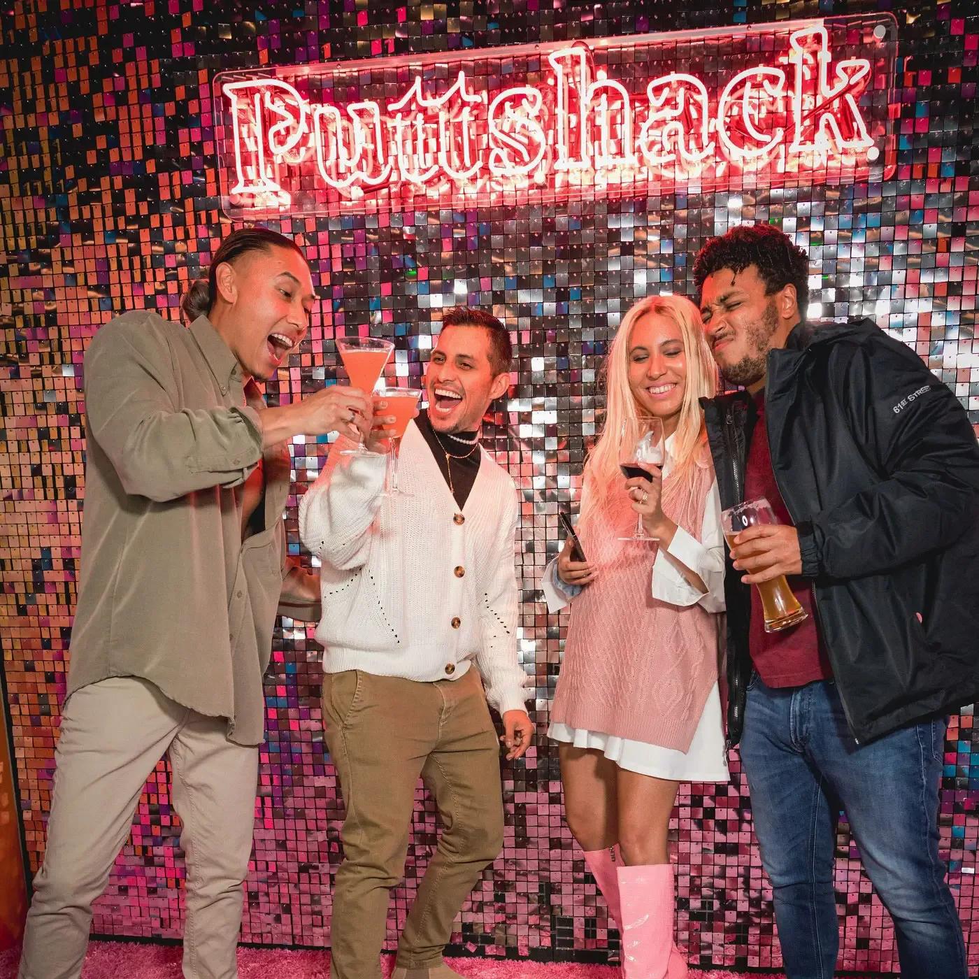 Puttshack guests posing for photo