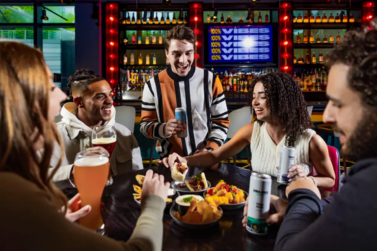 Eating and drinking at a table in Puttshack