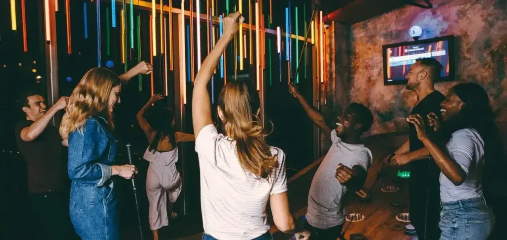 A group of young people cheering on a course