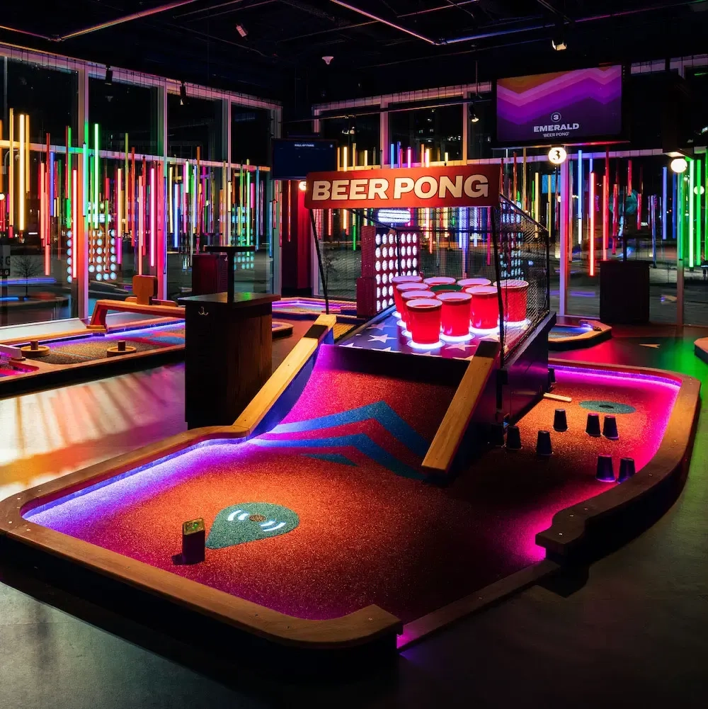 "Beer Pong" course all lit up under the Emerald course